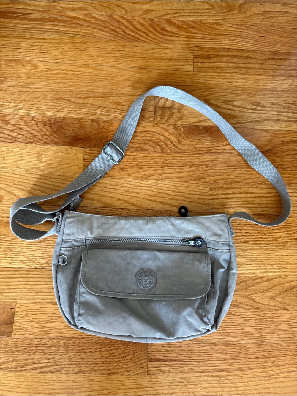 Kipling Gray/Taupe “Syro” Crossbody Bag with Front Flap
